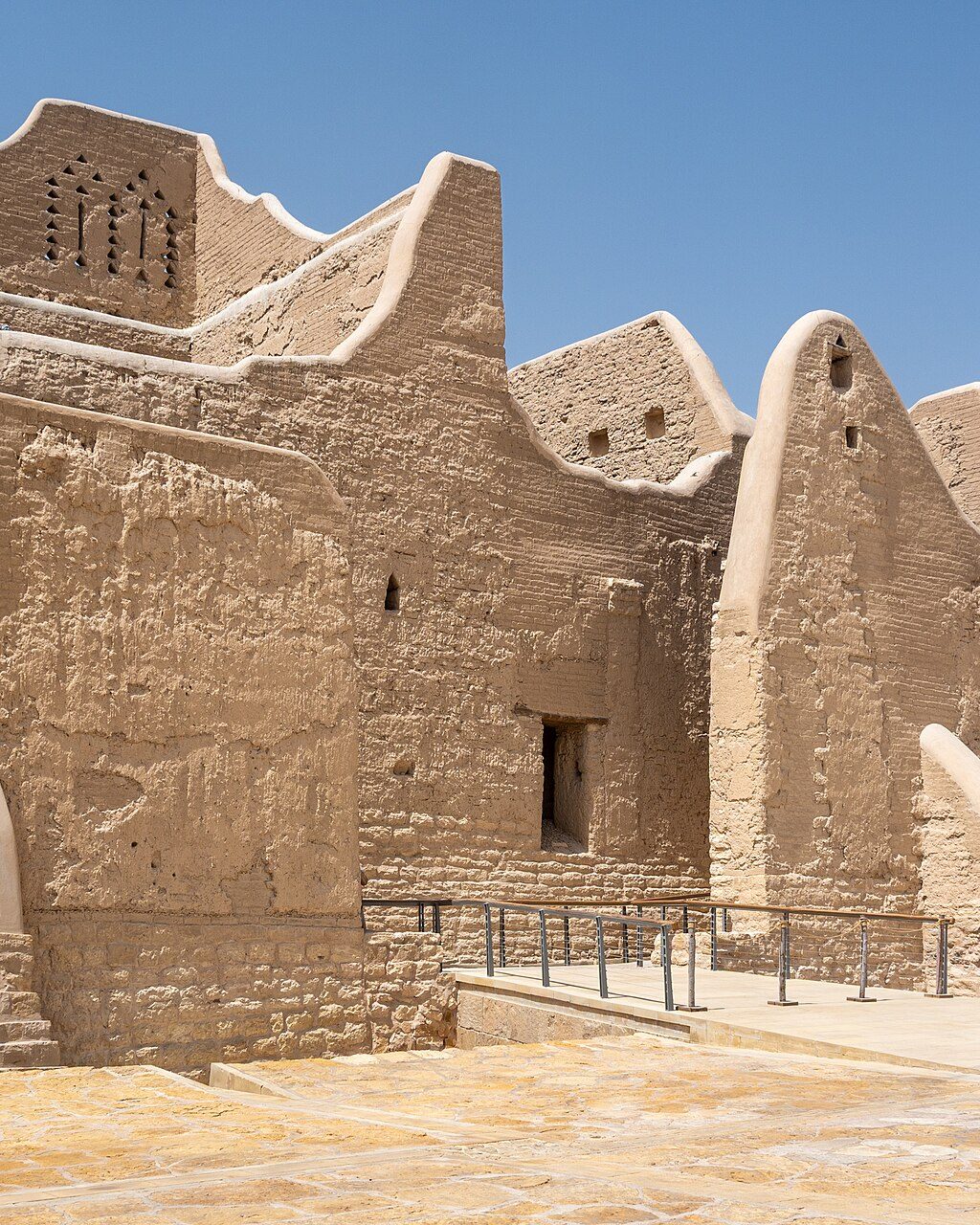 The mud walls and triangular crenellations of At-Turaif in Diriyah, north-west of Riyadh